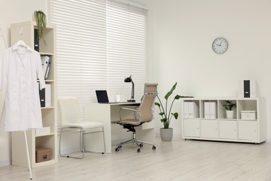 Modern medical office with doctor's workplace in clinic