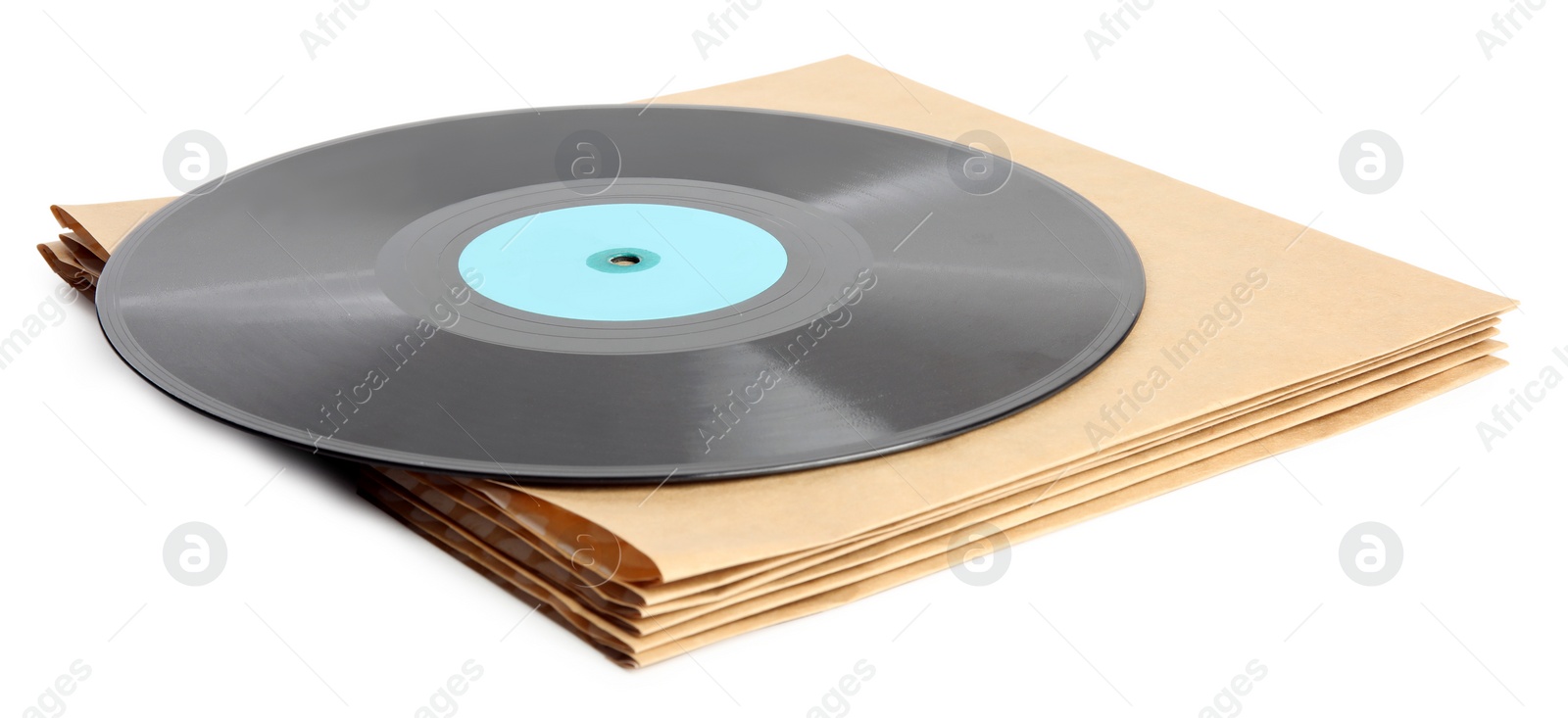 Photo of Vintage vinyl record and paper covers isolated on white