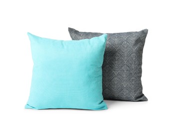 Different colorful decorative pillows on white background