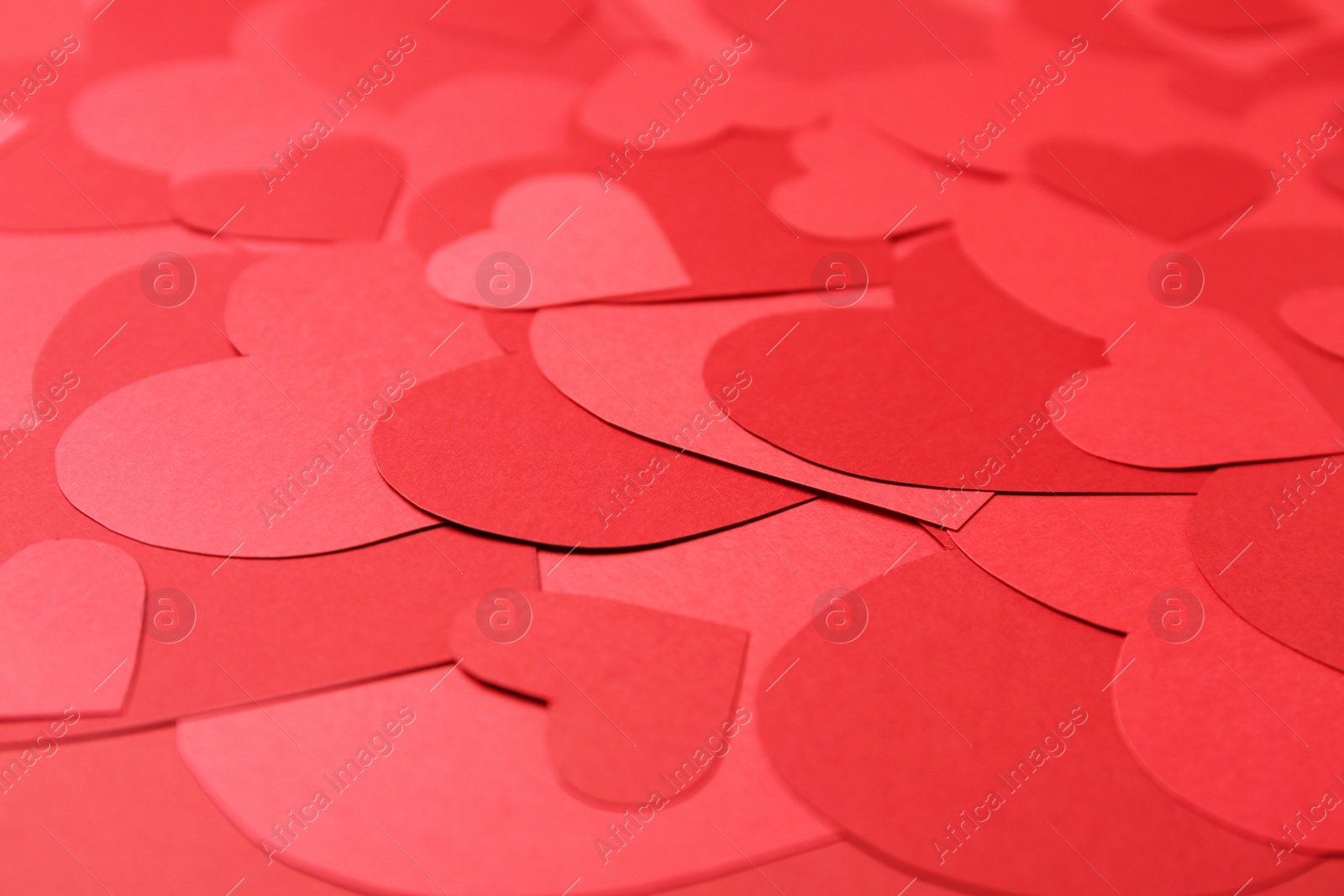 Photo of Beautiful red paper hearts as background, closeup