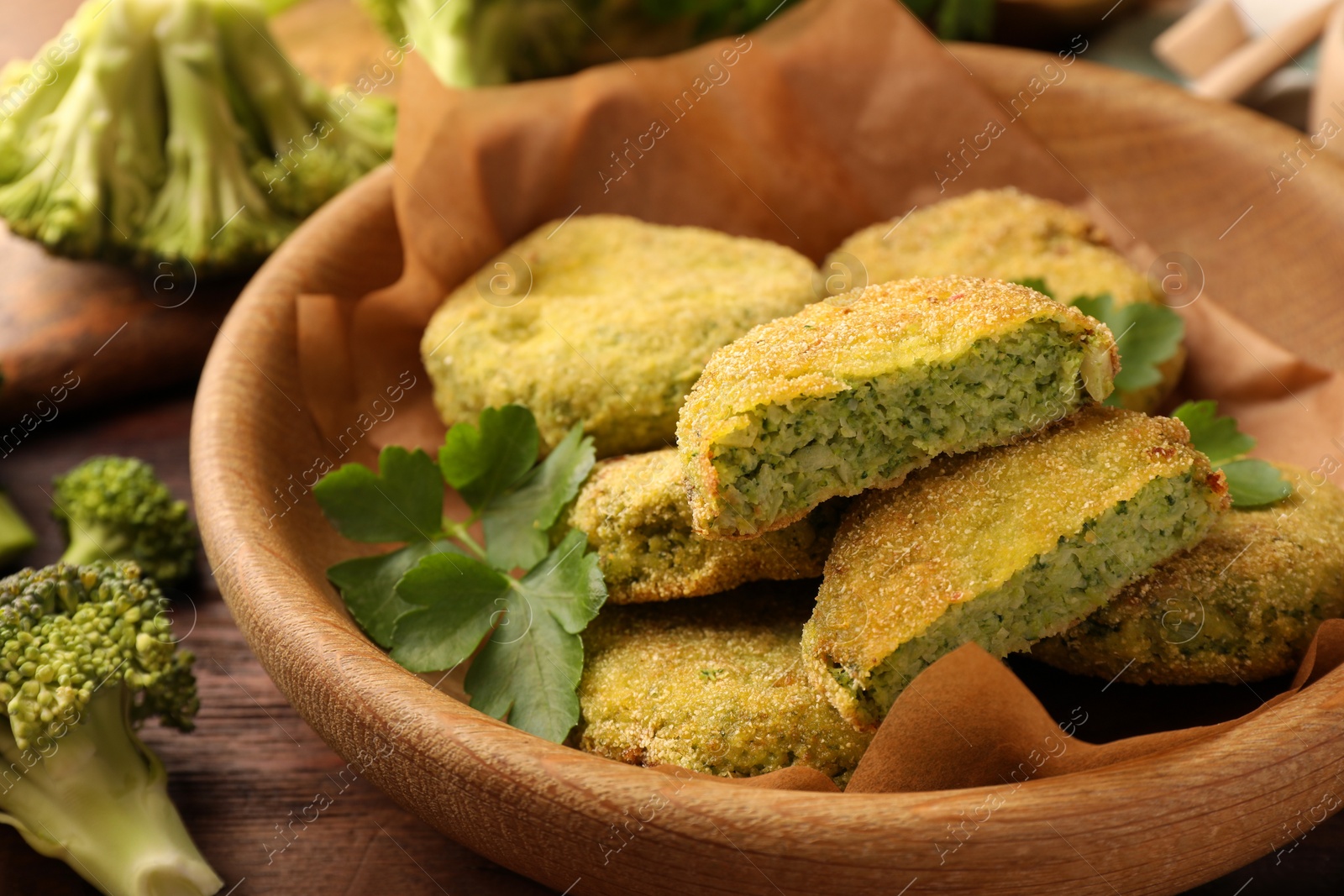 Photo of Tasty vegan cutlets and ingredients on table, closeup