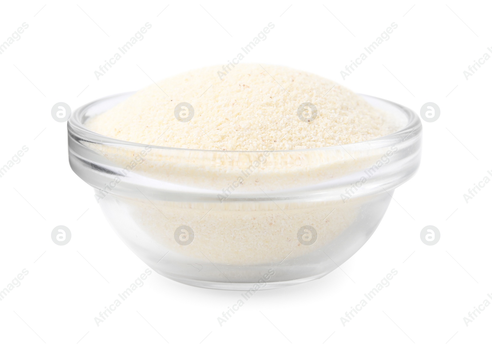 Photo of Bowl of uncooked organic semolina isolated on white