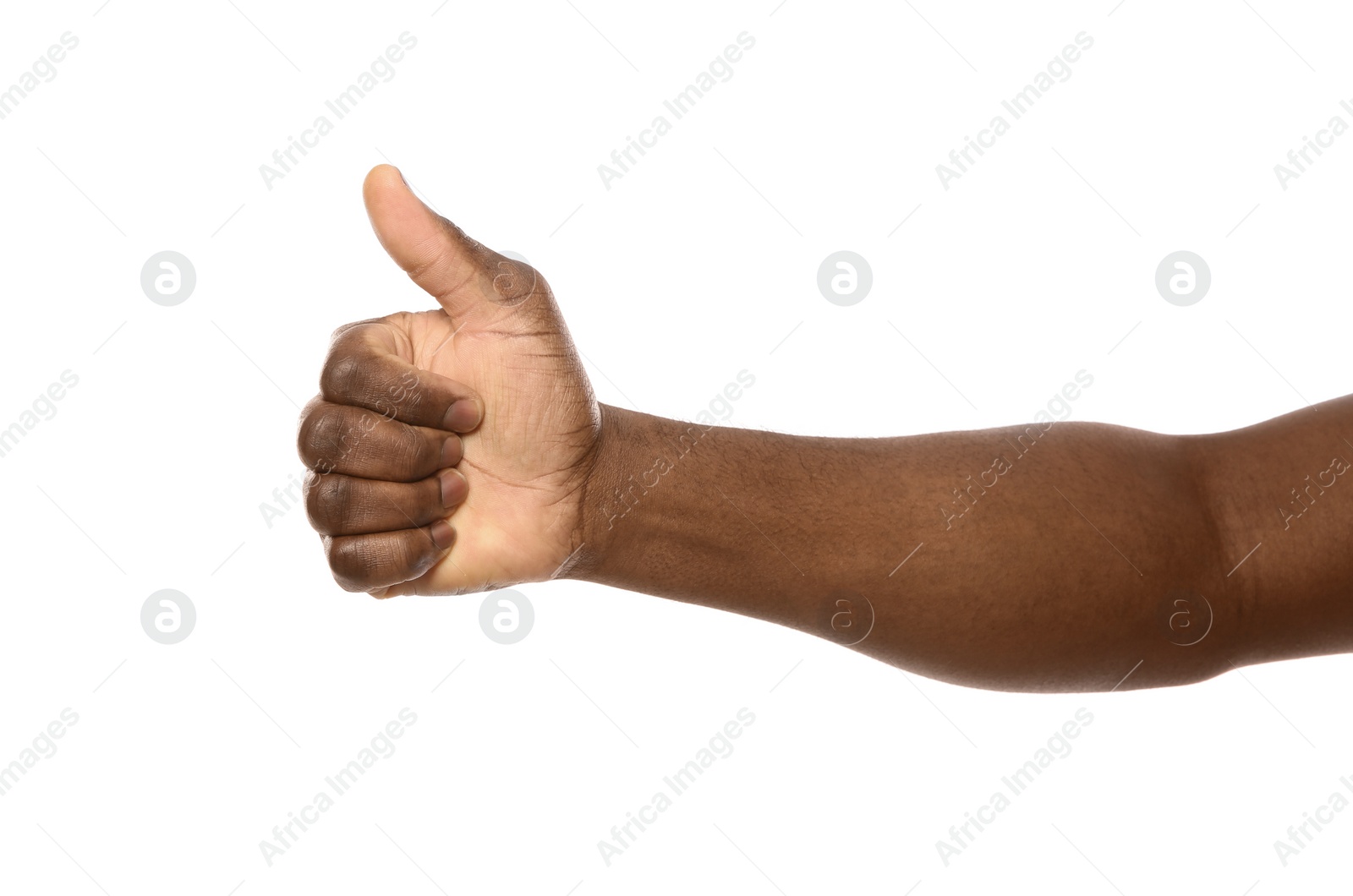 Photo of African-American man showing thumb up gesture on white background, closeup