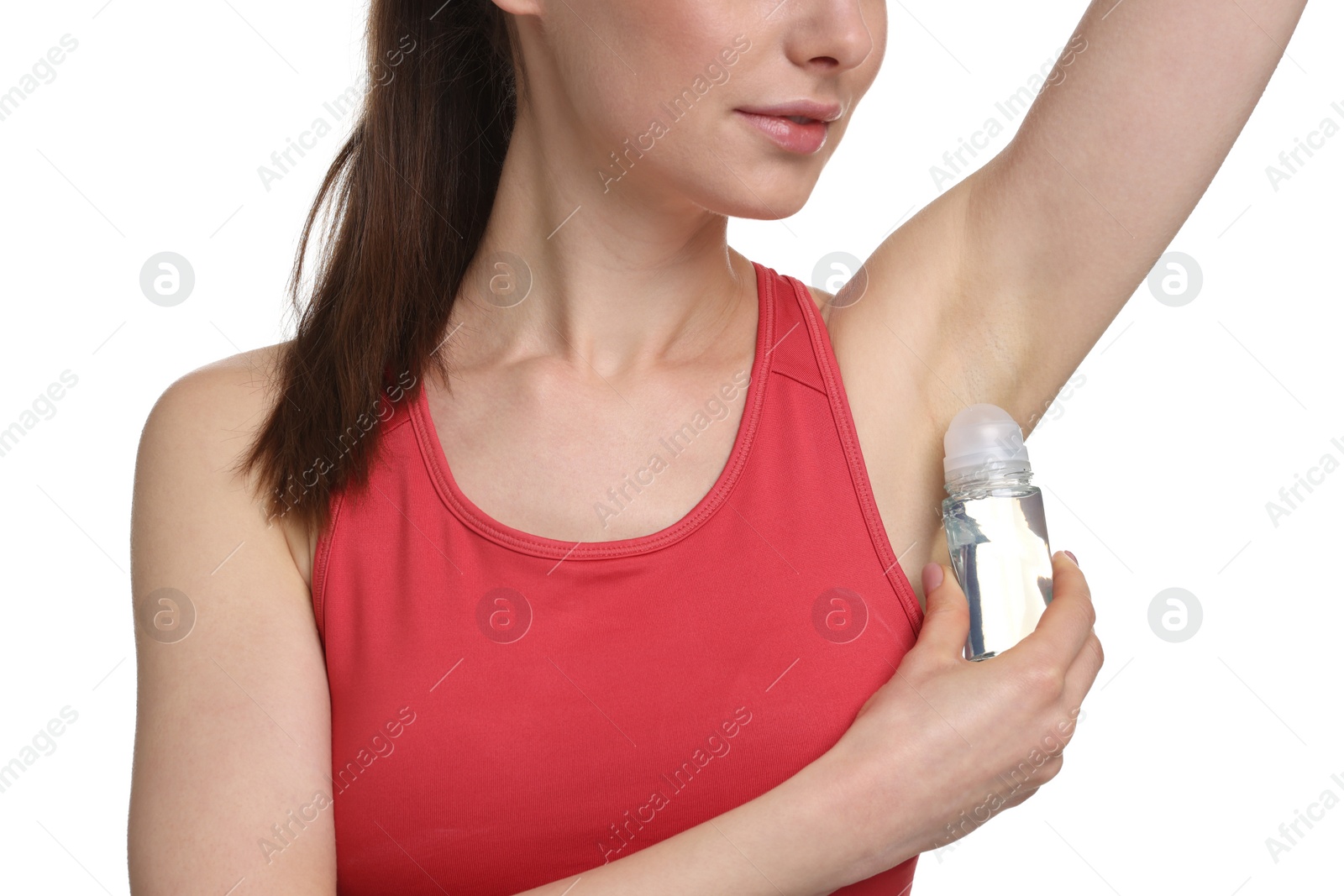 Photo of Woman applying deodorant on white background, closeup