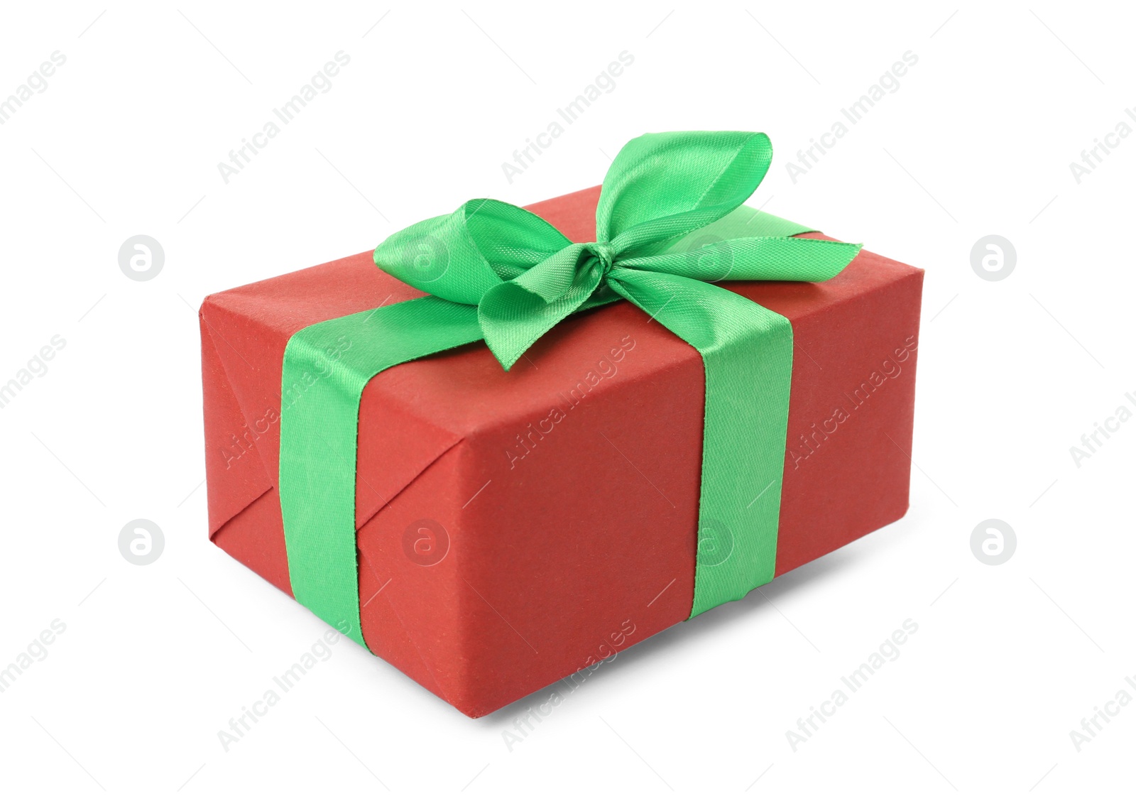 Photo of Red gift box with green bow isolated on white