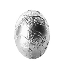 Chocolate egg wrapped in bright silver foil isolated on white