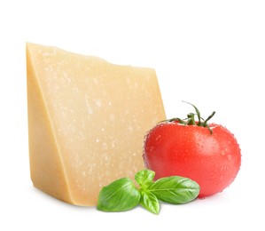 Image of Delicious parmesan cheese, tomato and basil on white background