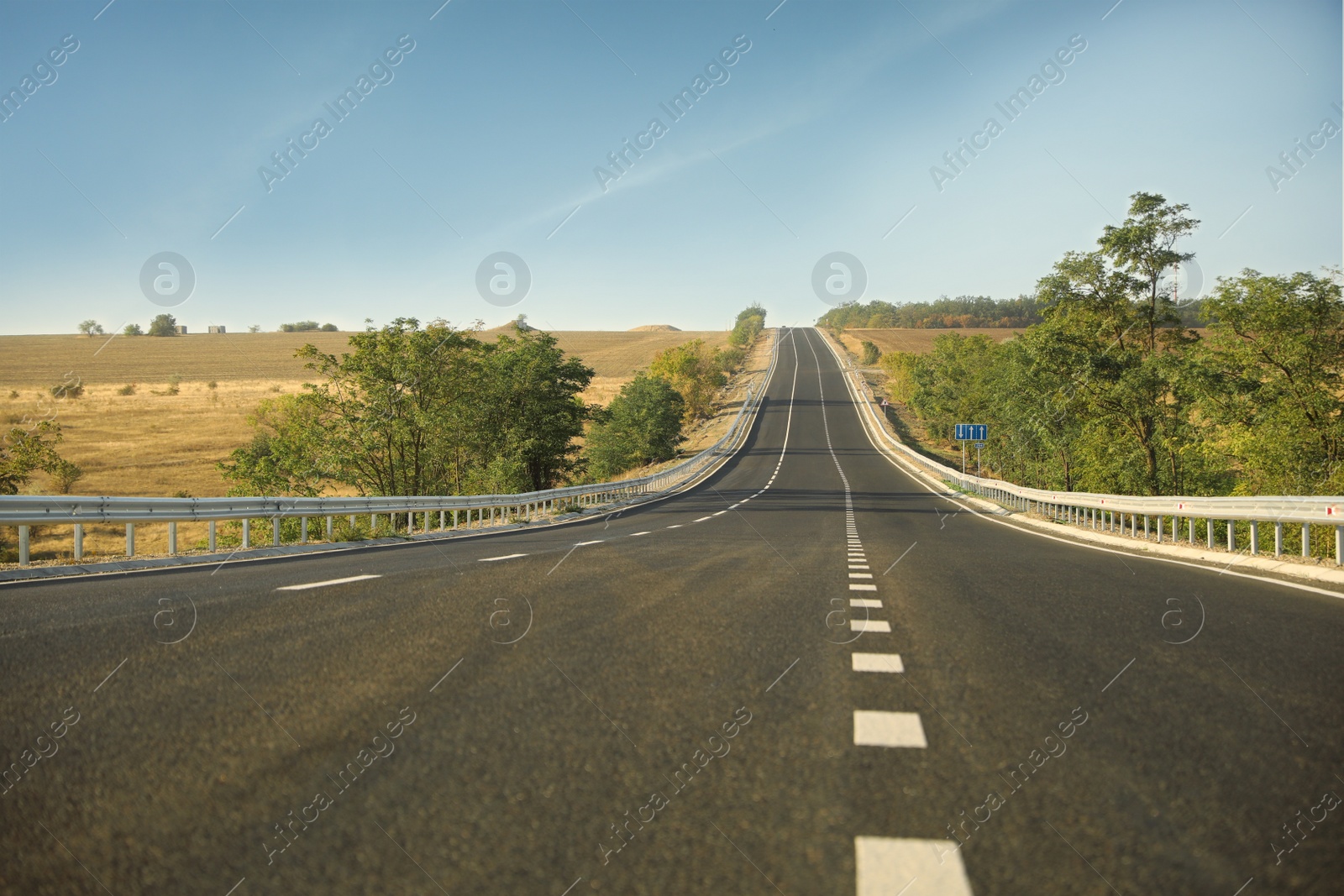 Photo of Beautiful view of empty asphalt highway. Road trip