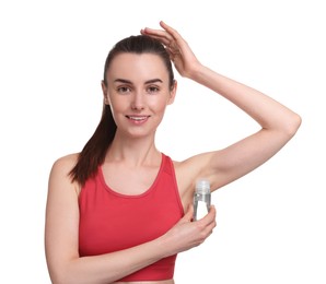 Photo of Beautiful woman applying deodorant on white background