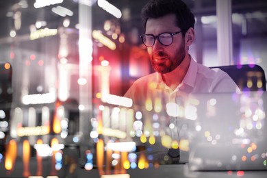 Image of Double exposure of successful businessman and cityscape