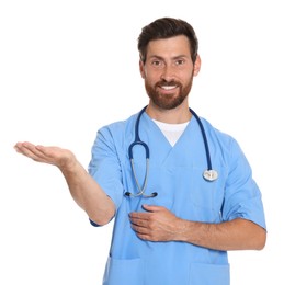 Photo of Portrait of doctor in scrubs on white background
