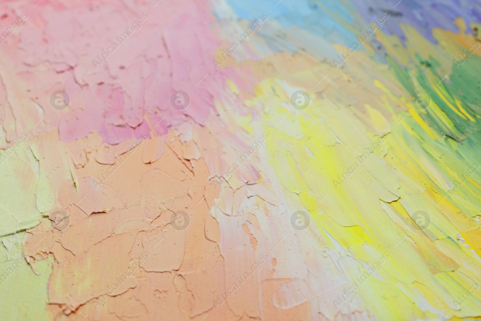 Photo of Beautiful strokes of pastel oil paints as background, closeup