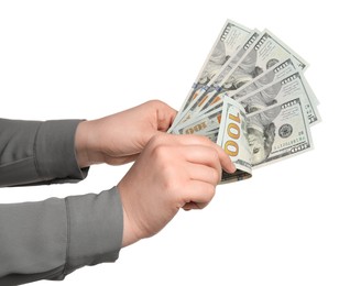 Photo of Money exchange. Woman counting dollar banknotes on white background, closeup