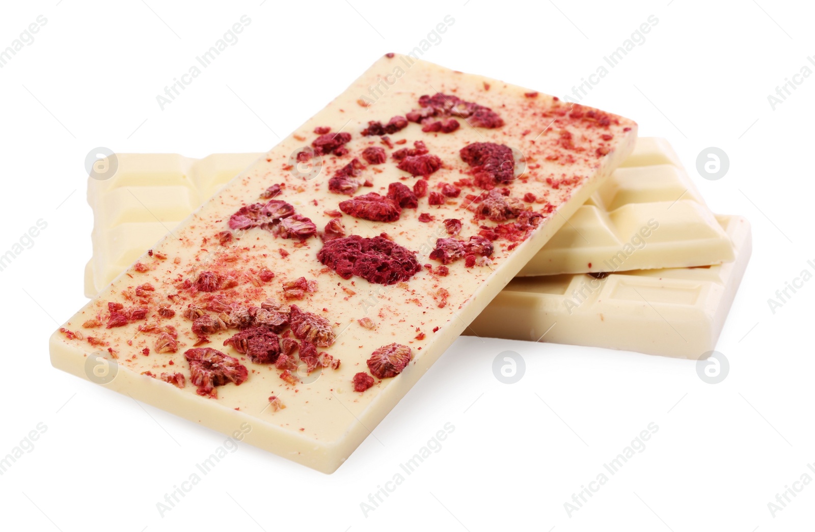 Photo of Chocolate bars with freeze dried raspberries on white background