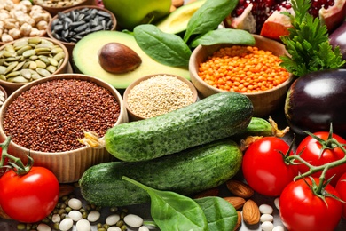 Photo of Different vegetables, seeds and fruits, closeup. Healthy diet