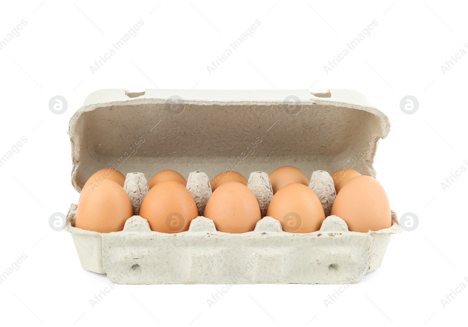 Photo of Raw chicken eggs in carton isolated on white