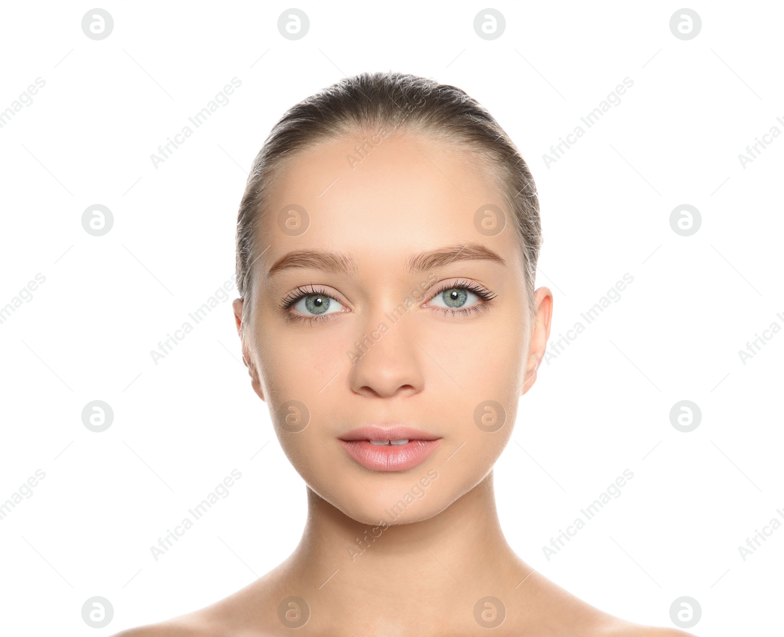 Photo of Portrait of young woman with foundation on her face against white background