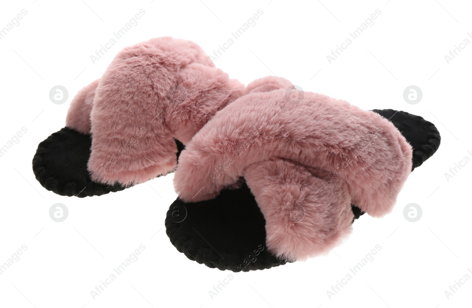 Photo of Pair of soft open toe slippers with pink fur on white background