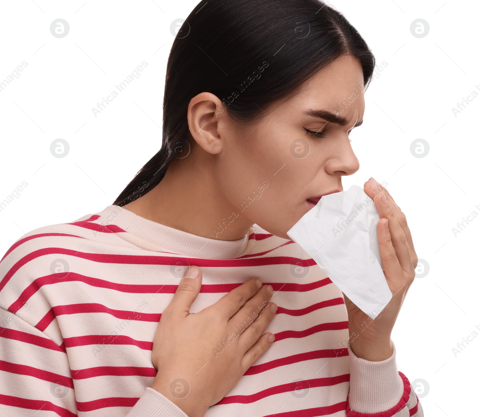 Photo of Woman with tissue coughing on white background. Cold symptoms