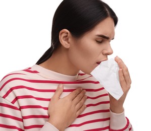 Photo of Woman with tissue coughing on white background. Cold symptoms