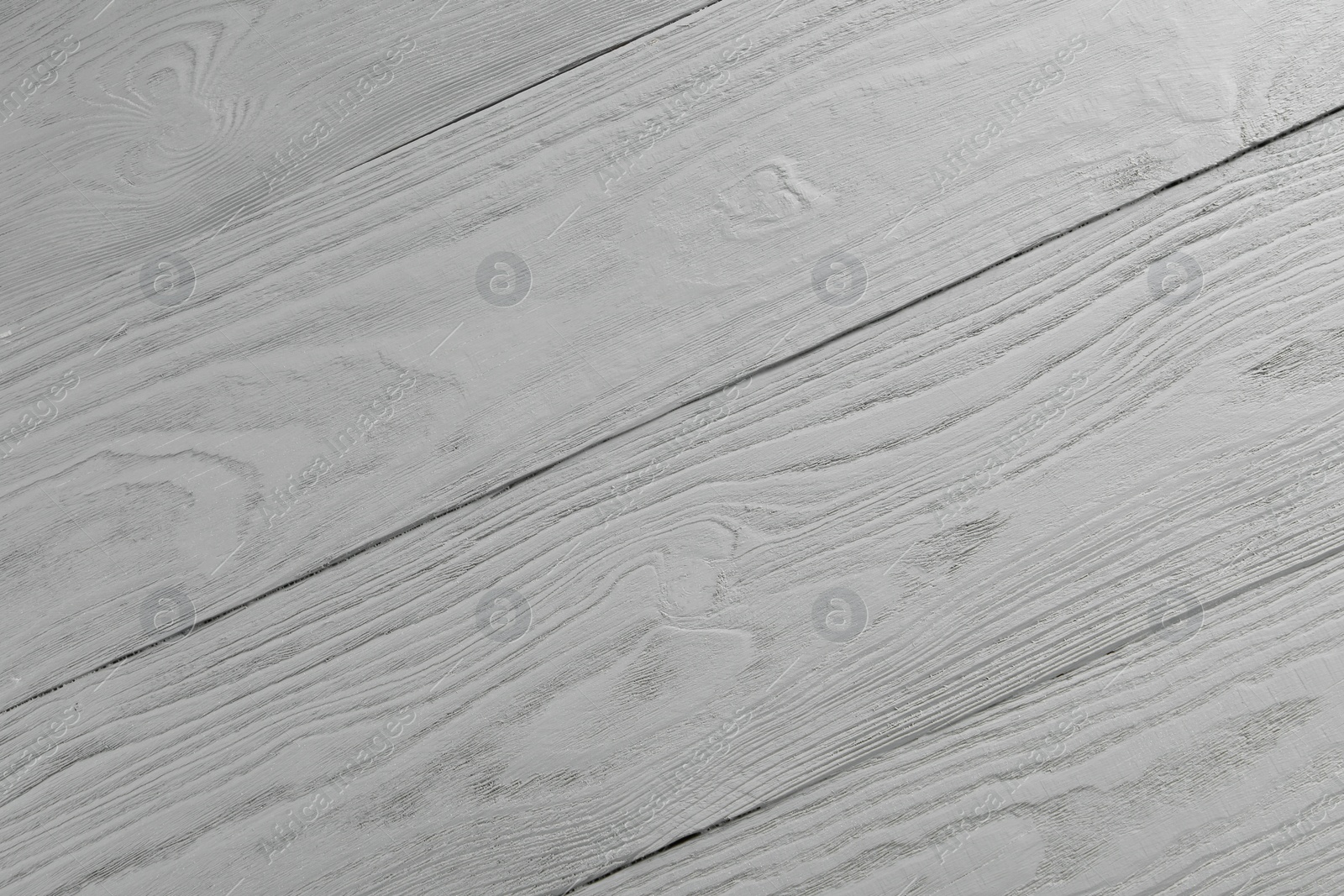 Photo of Texture of grey wooden surface as background, closeup