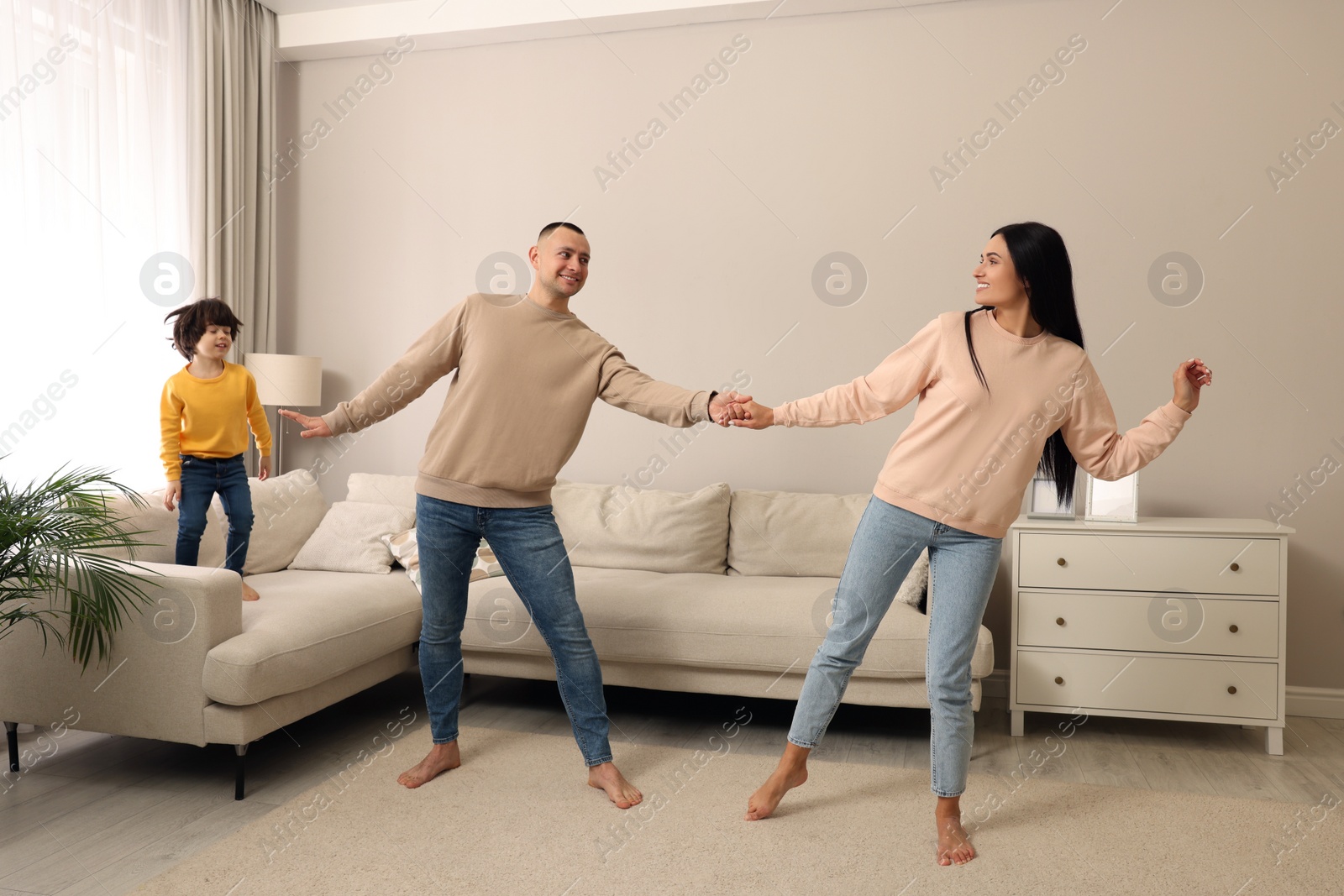 Photo of Happy family spending time together at home