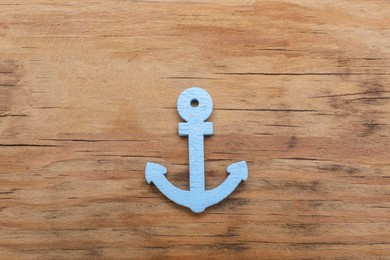 Photo of Anchor figure on wooden table, top view