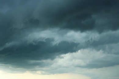 Photo of Sky with heavy rainy clouds on grey day