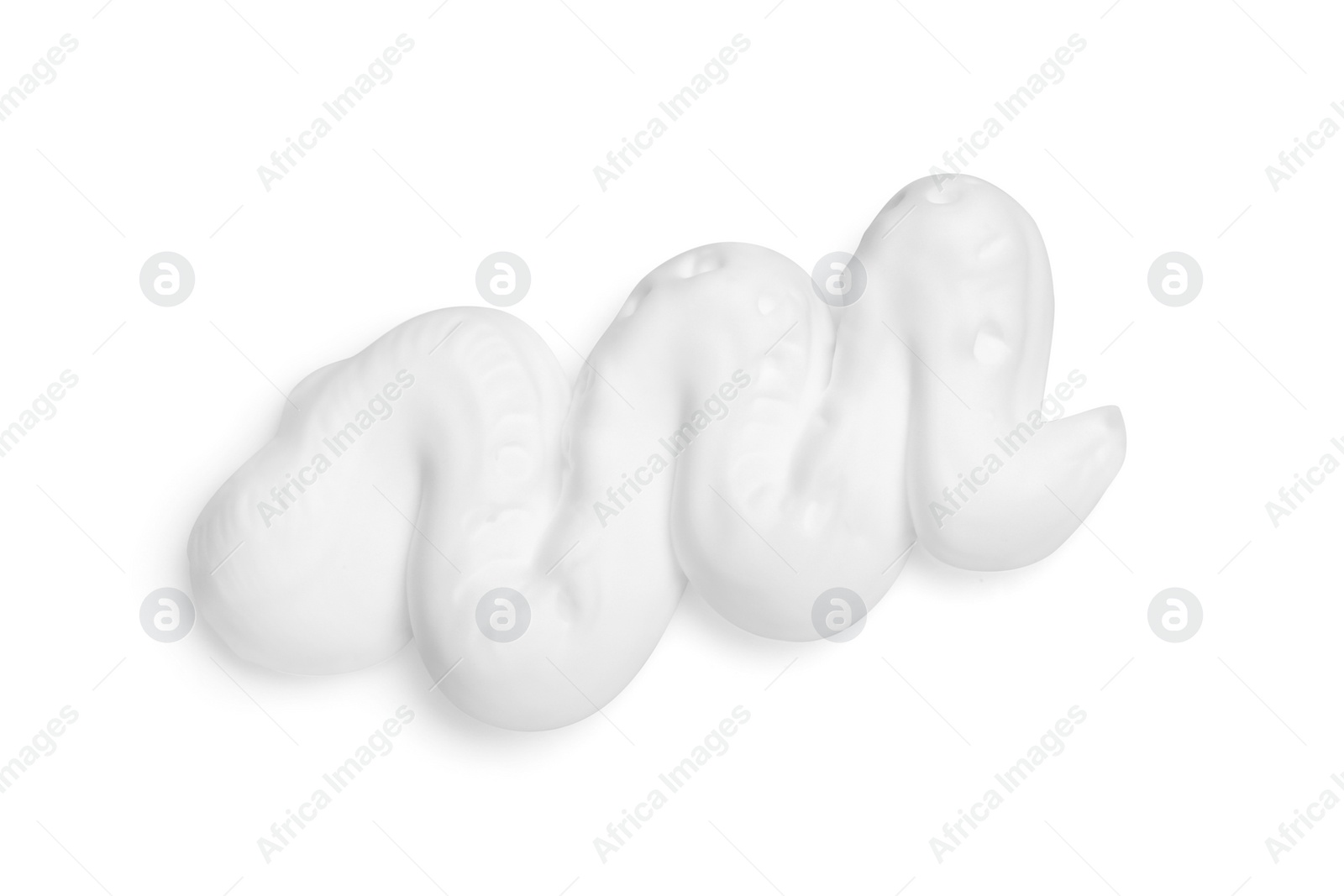 Photo of Smear of shaving foam isolated on white, top view