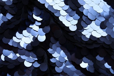 Photo of Beautiful shiny sequin fabric as background, closeup