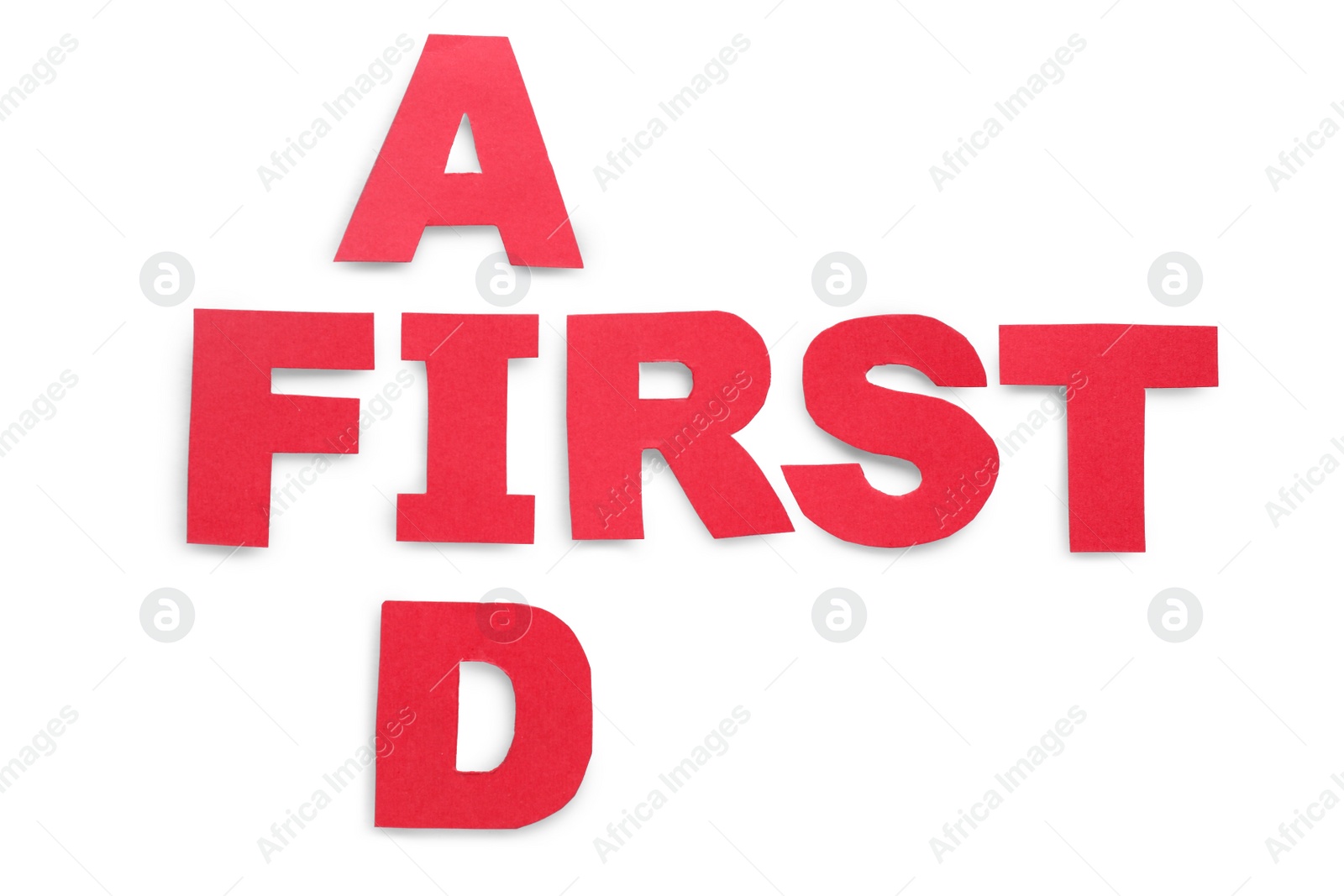 Photo of Words First Aid made of red letters isolated on white, top view