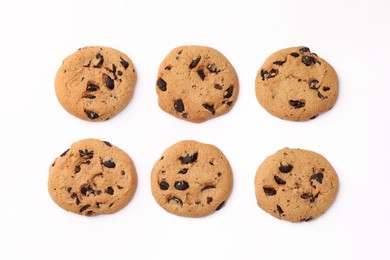 Photo of Delicious chocolate chip cookies on white background, flat lay