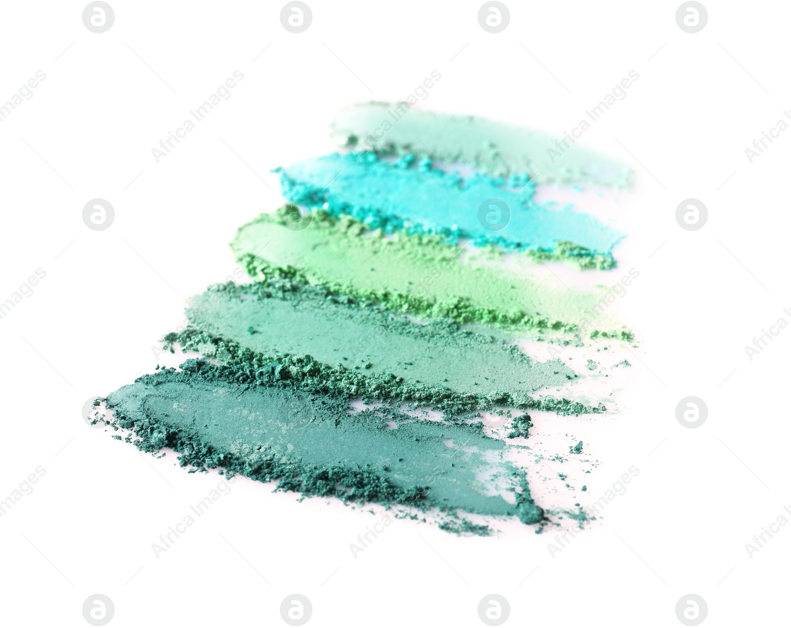 Photo of Crushed eye shadows on white background. Professional makeup products