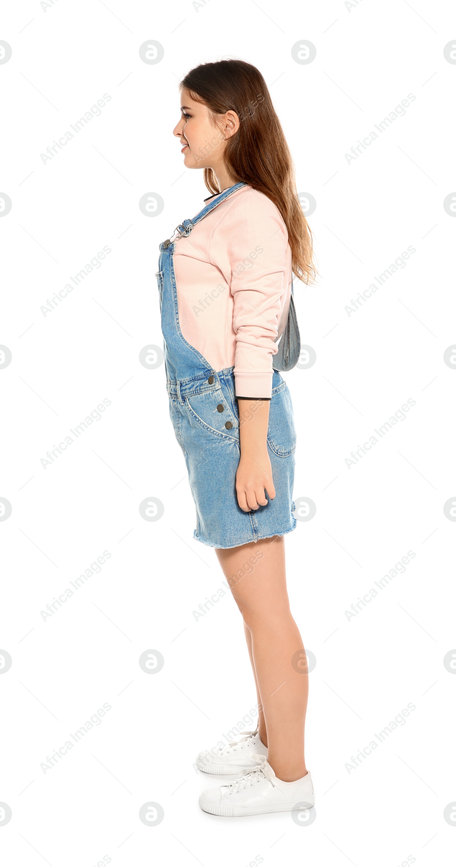 Photo of Beautiful teenage girl in stylish clothes on white background