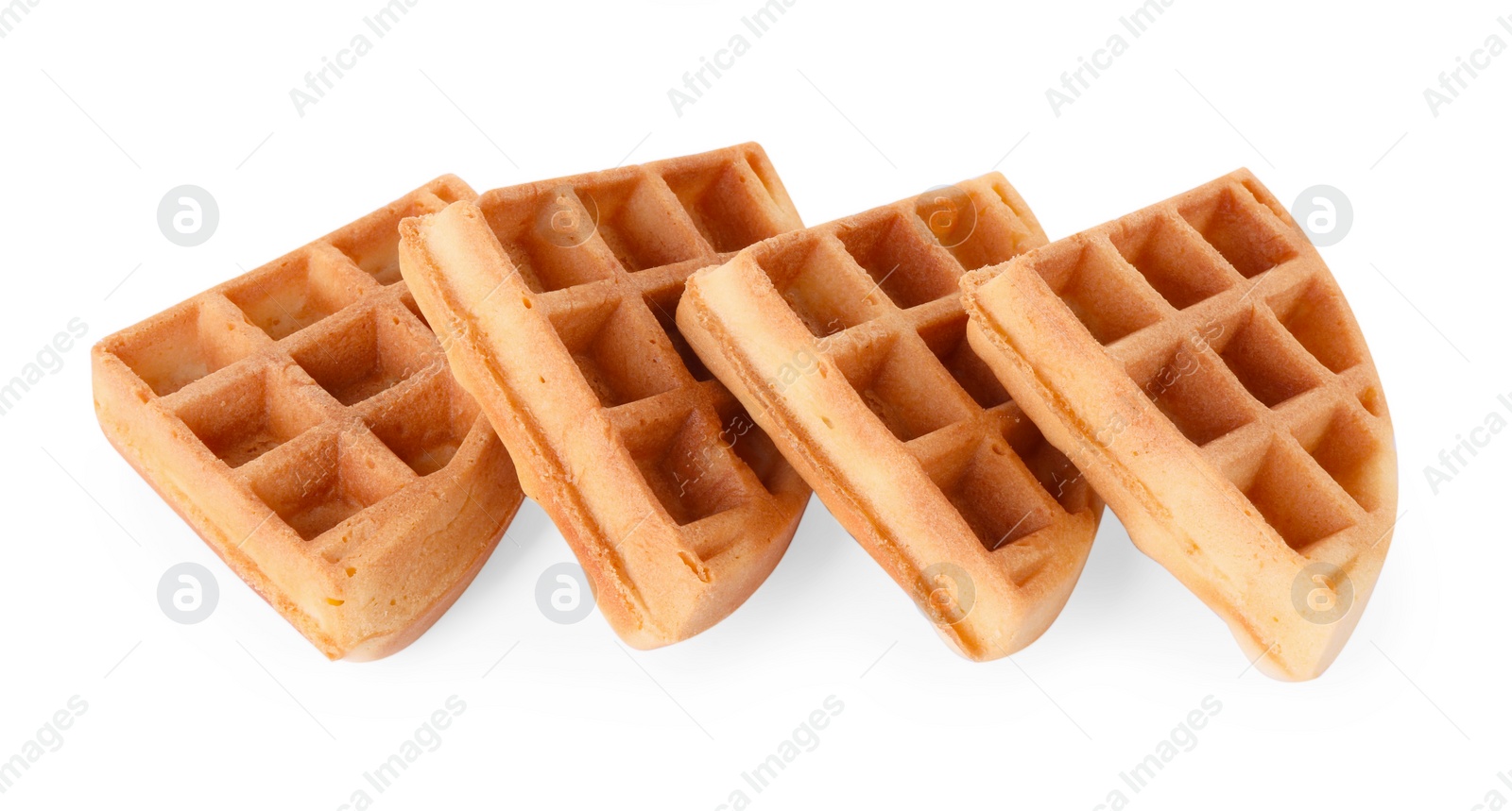Photo of Many tasty Belgian waffles isolated on white