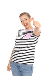 Photo of Young woman celebrating victory on white background
