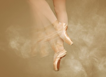 Image of Perfection in ballet. Woman dancing in pointe shoes on dark beige background, closeup. Motion effect with smoke