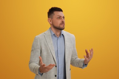 Angry man on yellow background. Hate concept