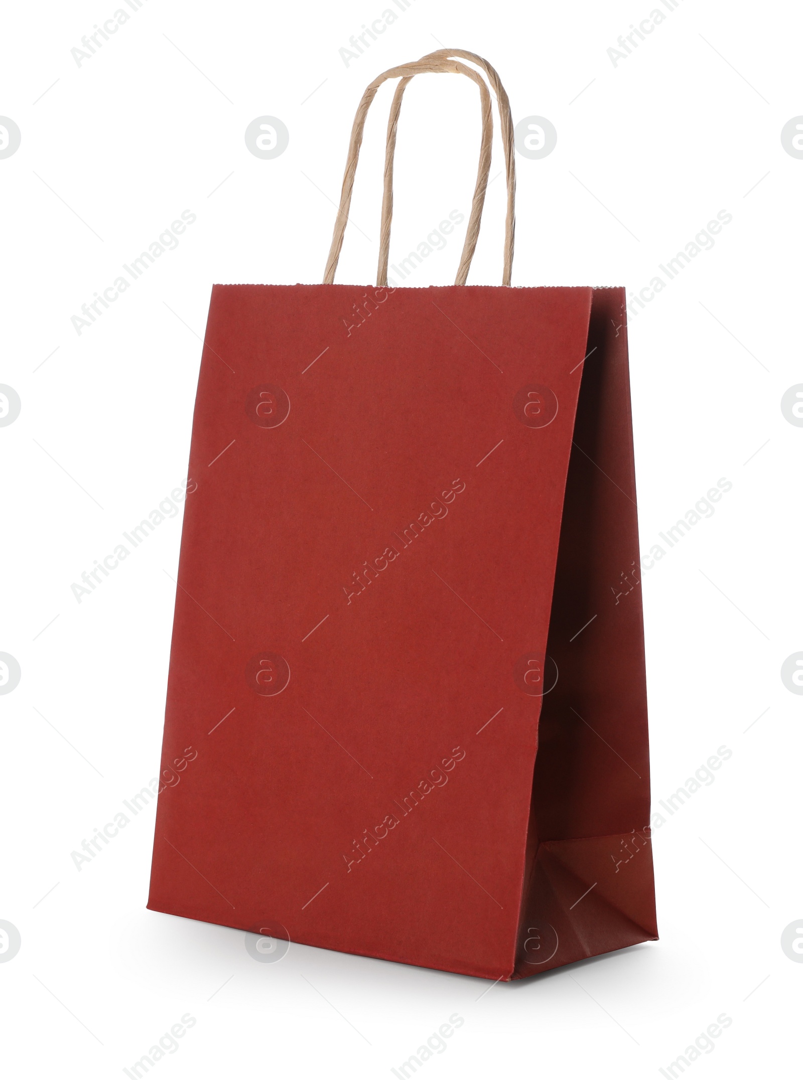 Photo of Blank red paper bag on white background. Space for design