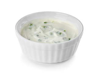 Bowl with sour cream and herbs on white background