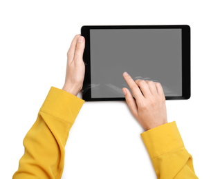 Woman working with tablet on white background, top view