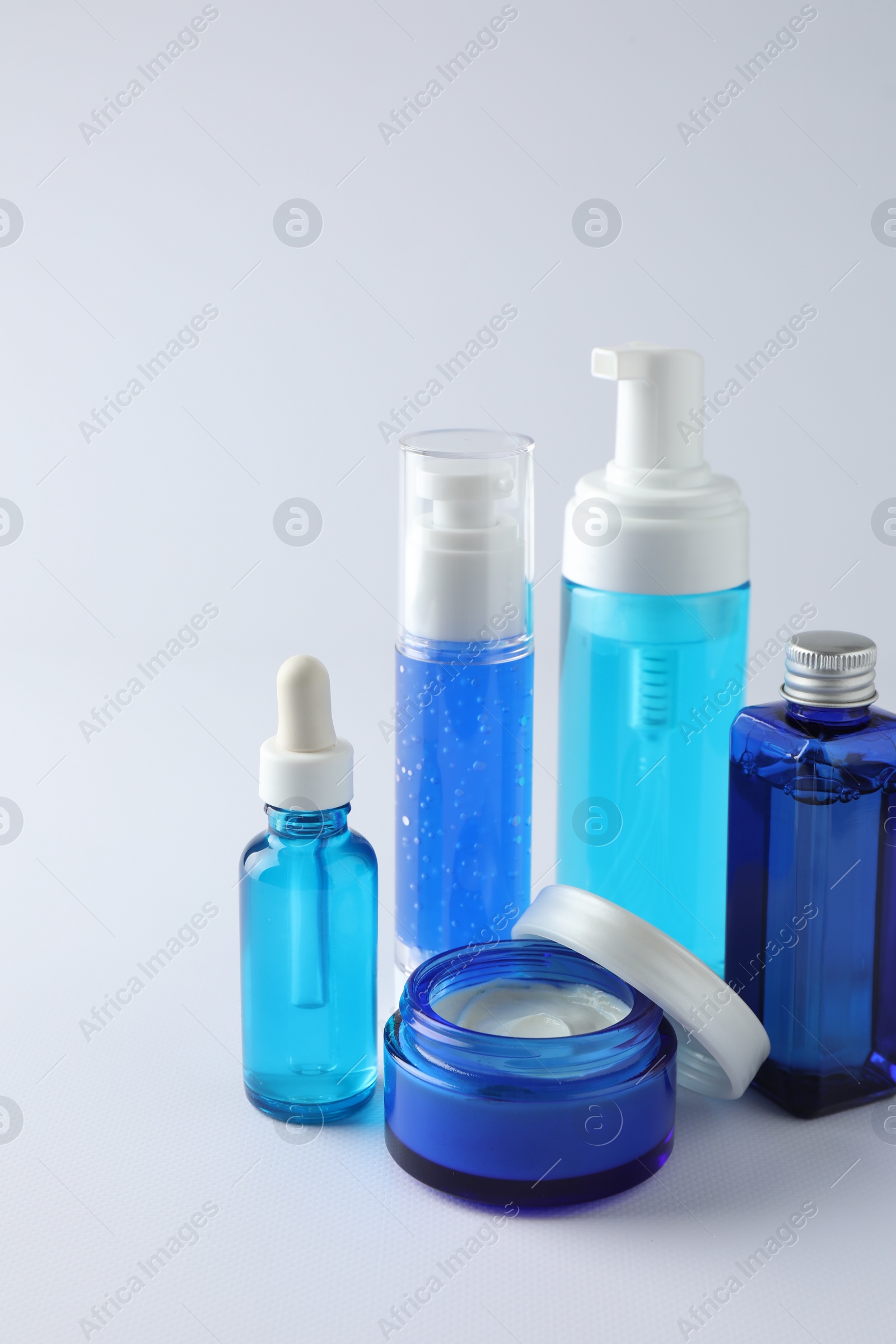 Photo of Set of luxury cosmetic products on white background