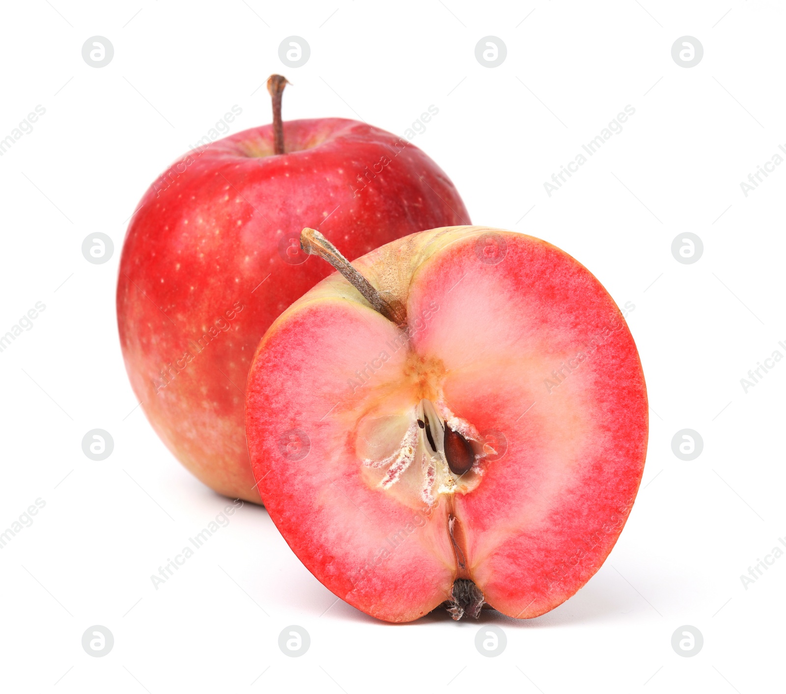 Photo of Tasty apples with red pulp isolated on white