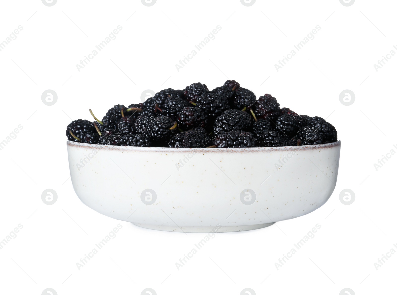 Photo of Bowl of delicious ripe black mulberries isolated on white