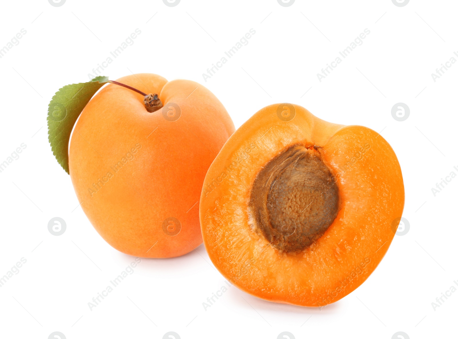 Photo of Delicious ripe sweet apricots isolated on white