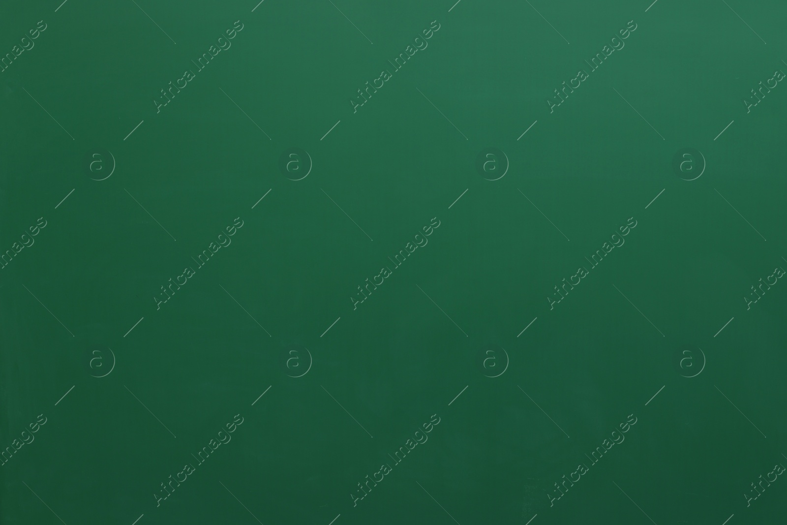 Photo of Blank green chalkboard as background. Space for text