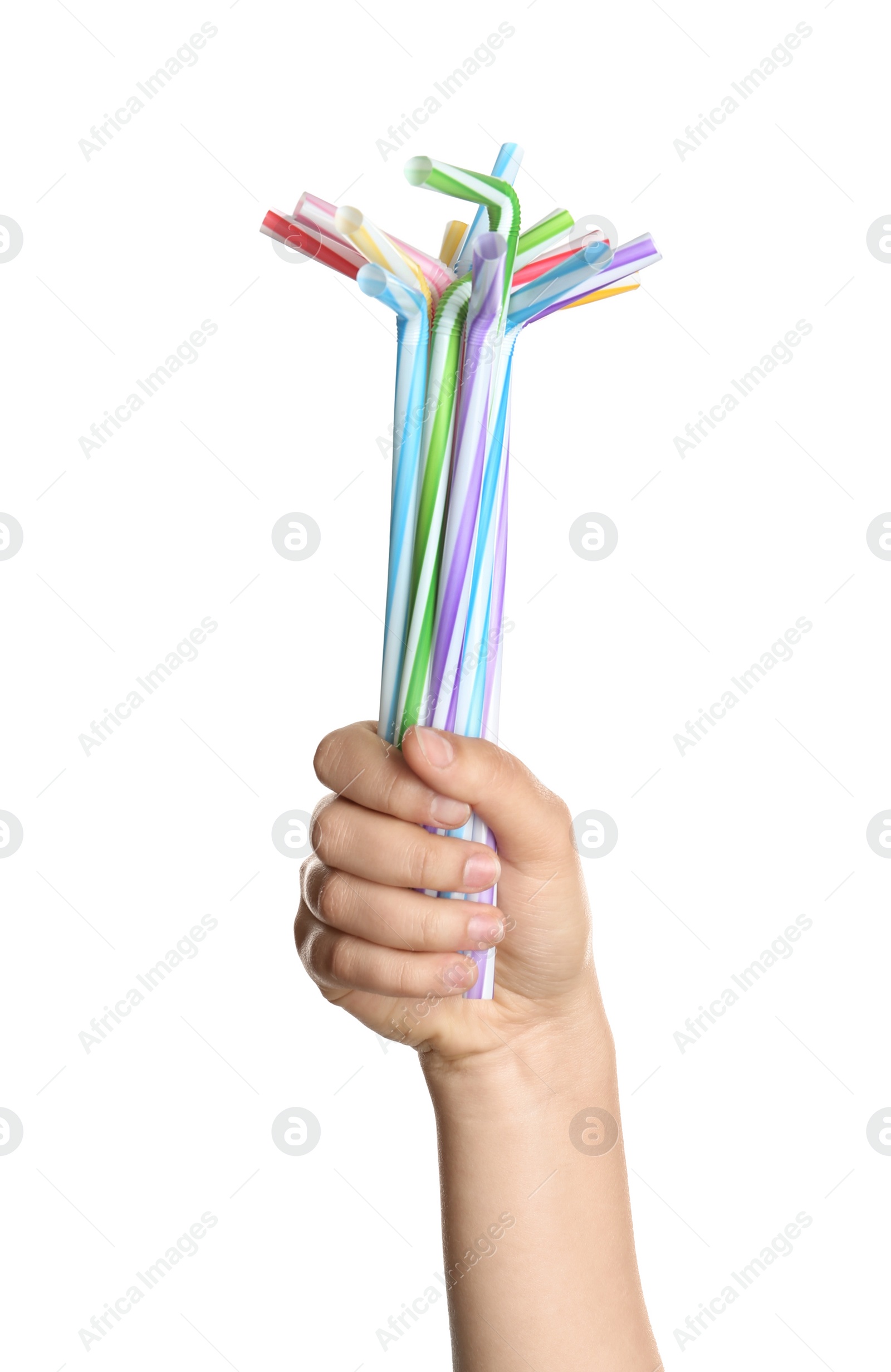 Photo of Woman holding bunch of plastic straws on white background, closeup