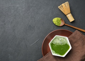 Photo of Flat lay composition with matcha tea on table