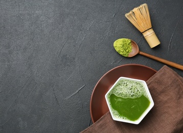 Flat lay composition with matcha tea on table