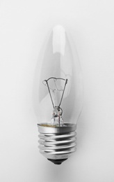 Light bulb on white background, top view. Electrician's equipment